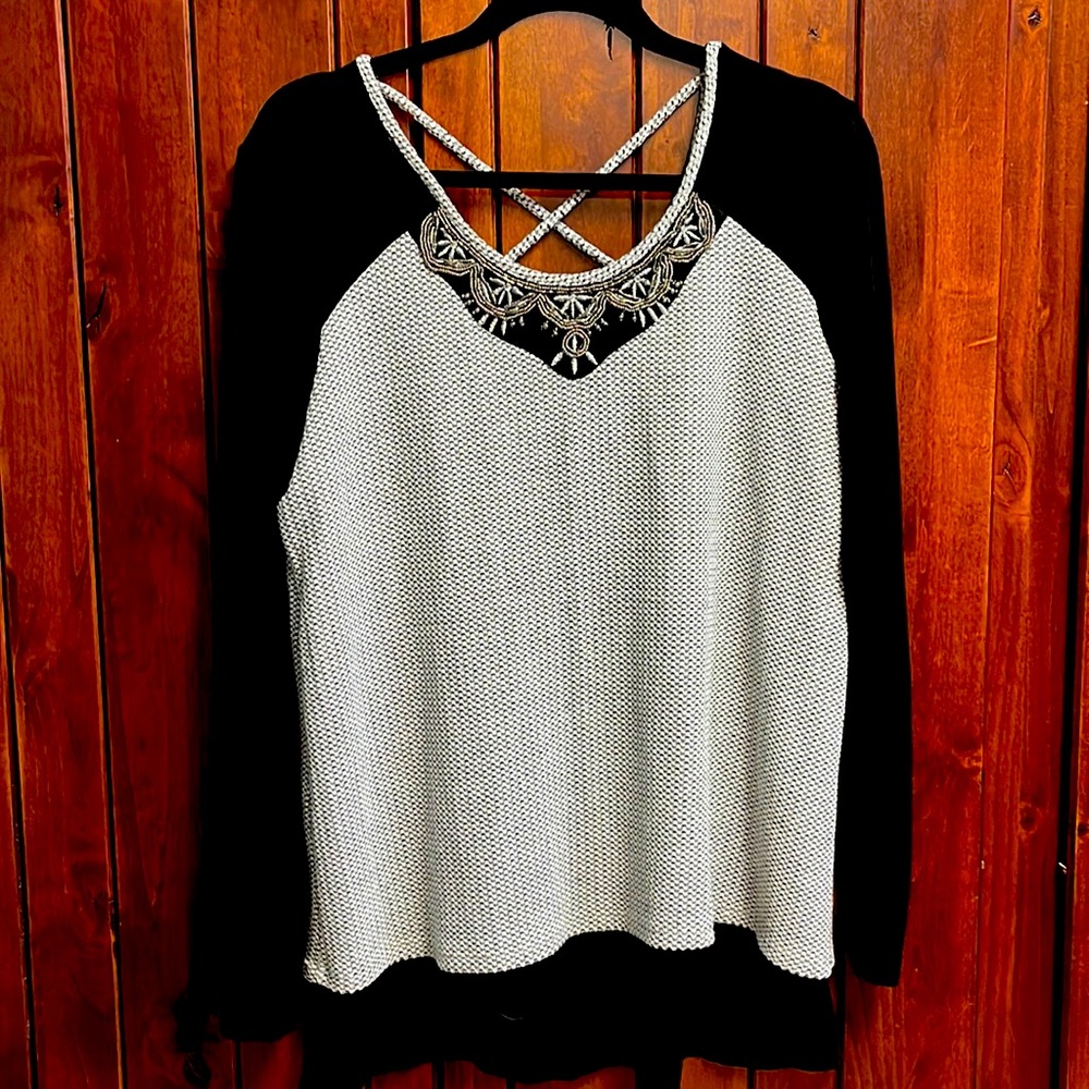 Maurice’s top. Black and Gray. New never worn but washed once.
